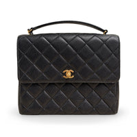 Chanel Vintage Top Handle Flap in black caviar leather, gold hardware – image 1